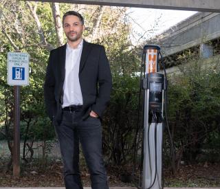 Gleb Yushin at EV charging station