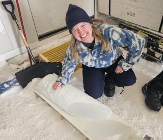 Moore pictured on her birthday, holding the final ice core.