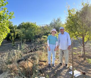 Georgia Tech graduate student Chang Ding posing with a local villager at a seismic site in Southern Turkey