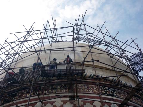 Workers cleaning Taj Mahal